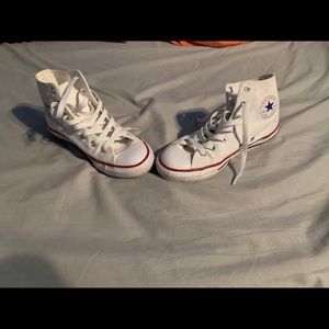 White high top converse.